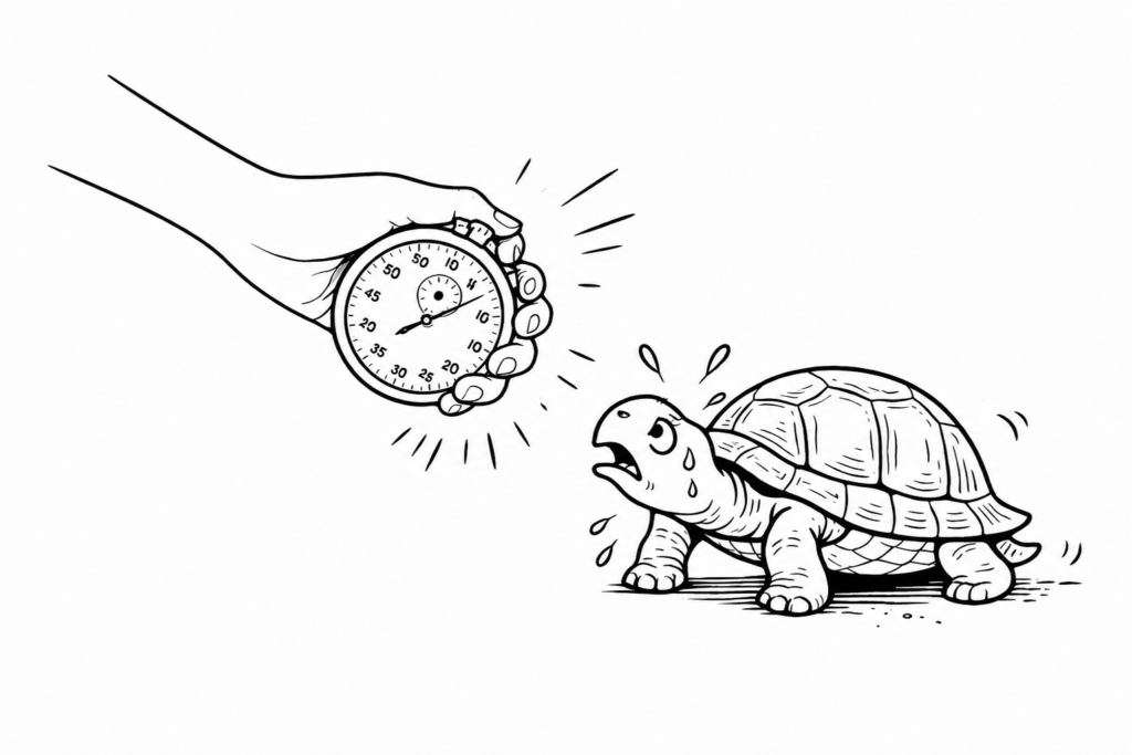 A hand holds a stopwatch up to a struggling turtle, a metaphor for demanding impossible speed from the wrong person.